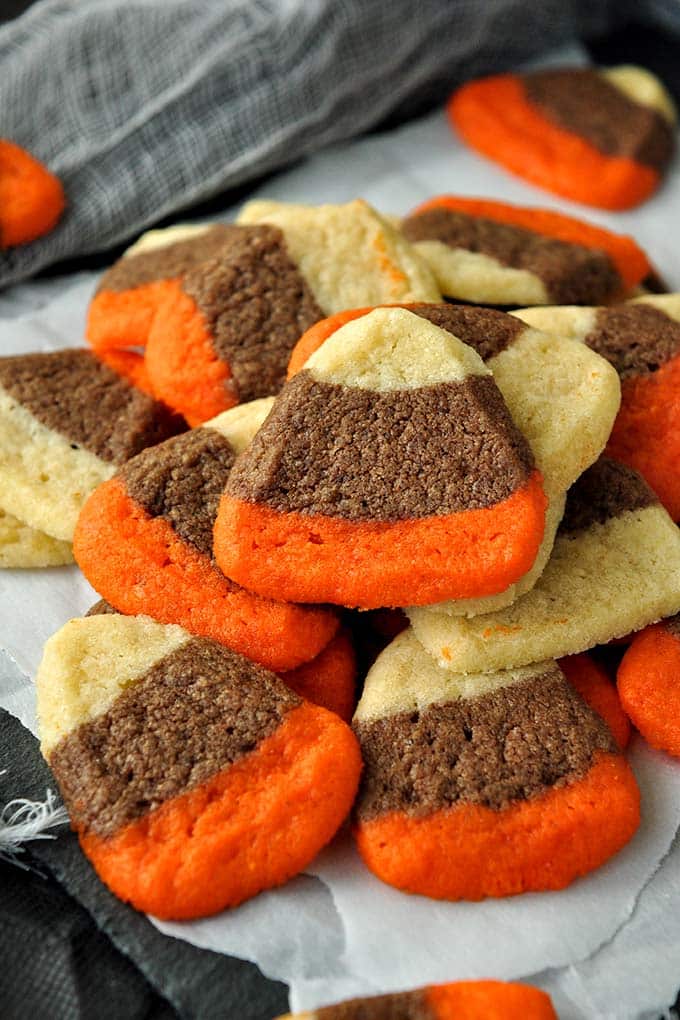 A close up of candy corn cookies.