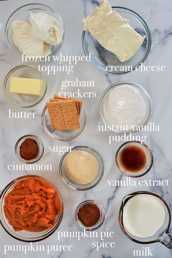 All of the ingredients needed to make no bake pumpkin pie cheesecake bars.