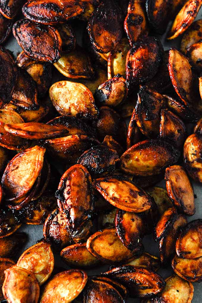 An up close view of barbecue flavored air fryer pumpkin seeds.