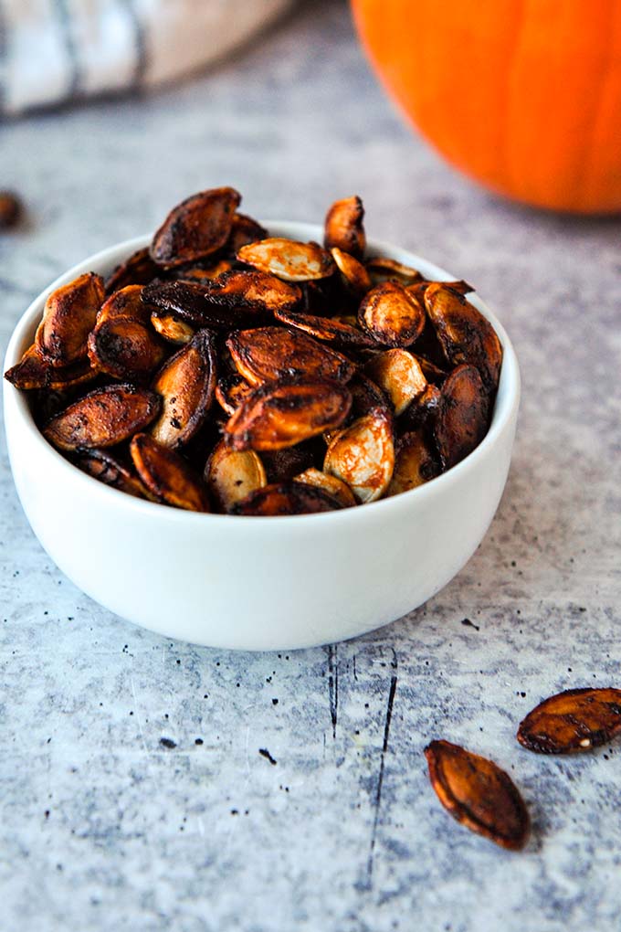 A small bowl of barbecue air fryer pumpkin seeds.
