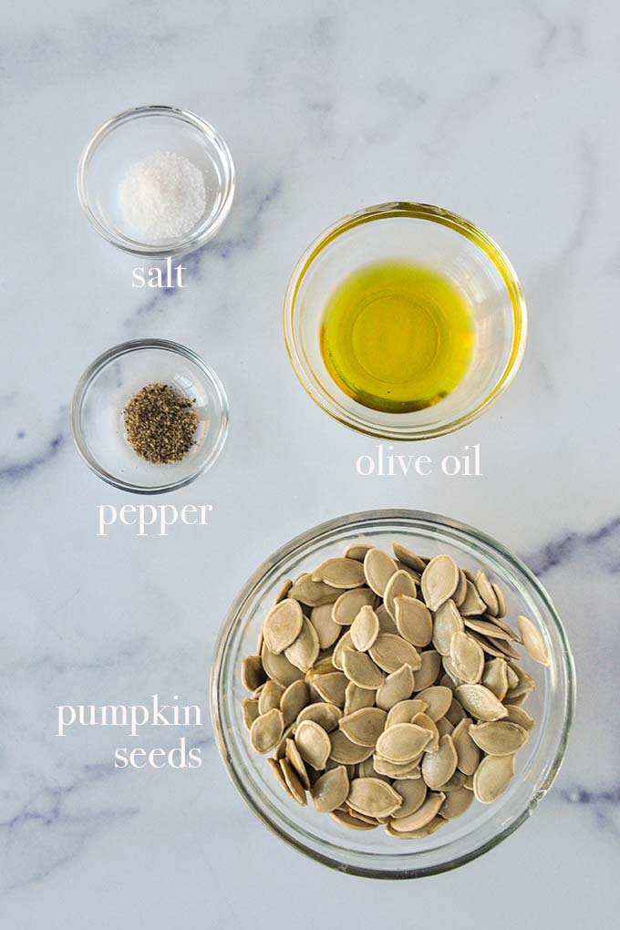 All of the ingredients to make air fryer pumpkin seeds.