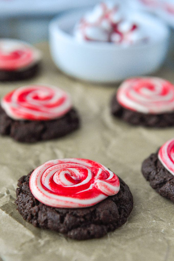 An up close frosted peppermint brownie cookie.