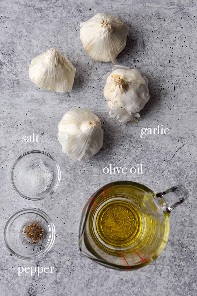 The ingredients needed to make roasted garlic in the air fryer.