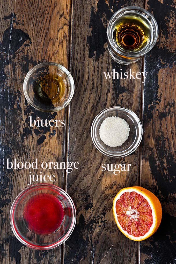 All of the ingredients needed to make the blood orange old fashioned