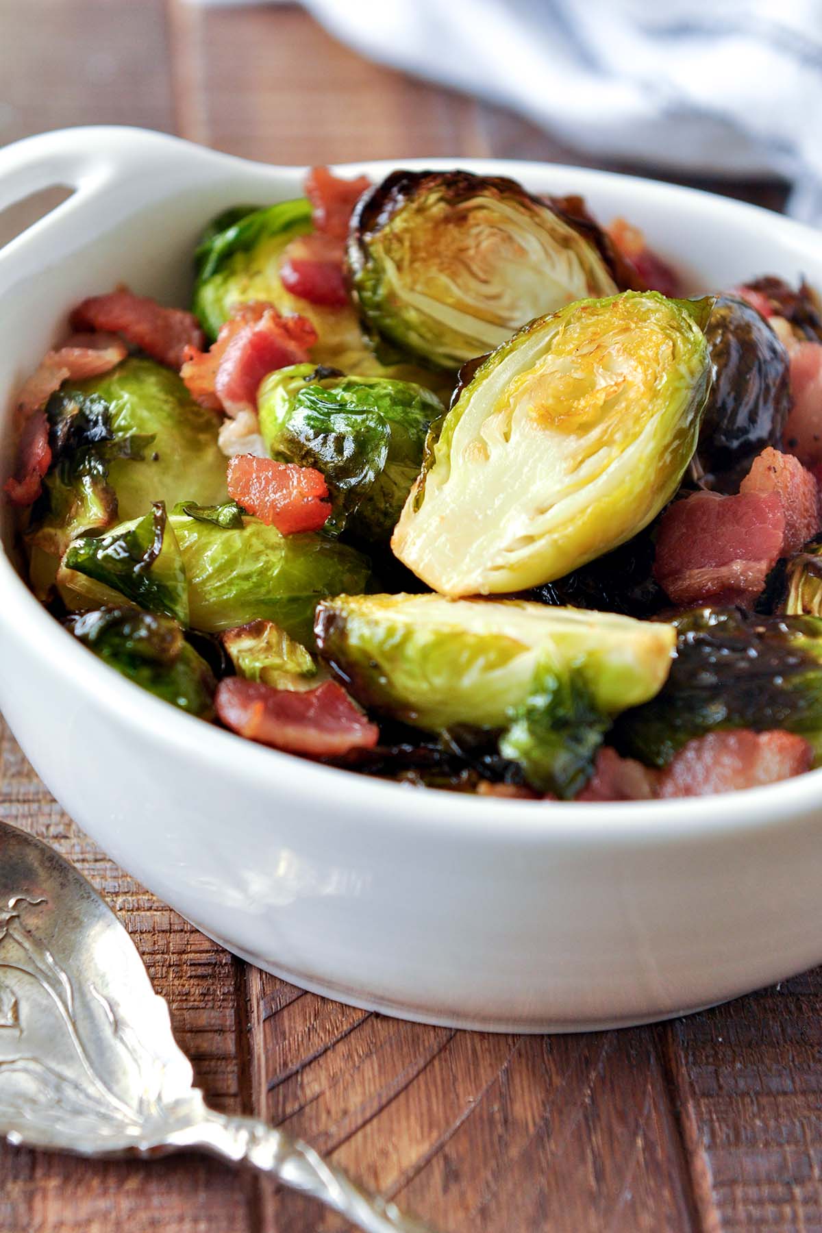 A bowl of air fryer Brussels sprouts with bacon.