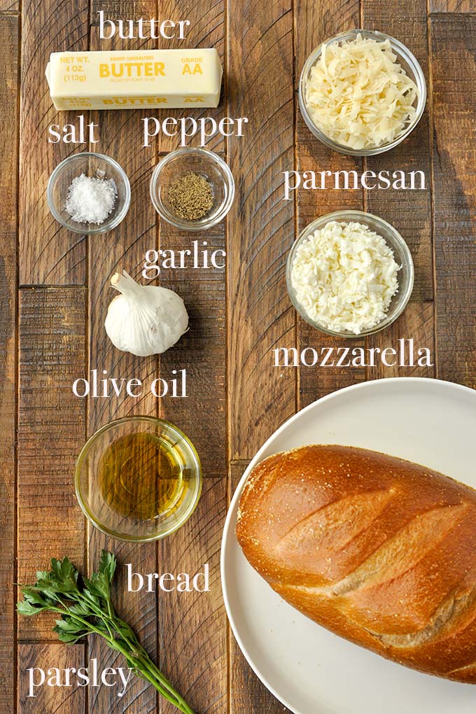All of the ingredients needed to make garlic bread.
