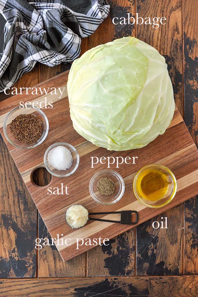 All of the ingredients needed to make garlic cabbage steaks.