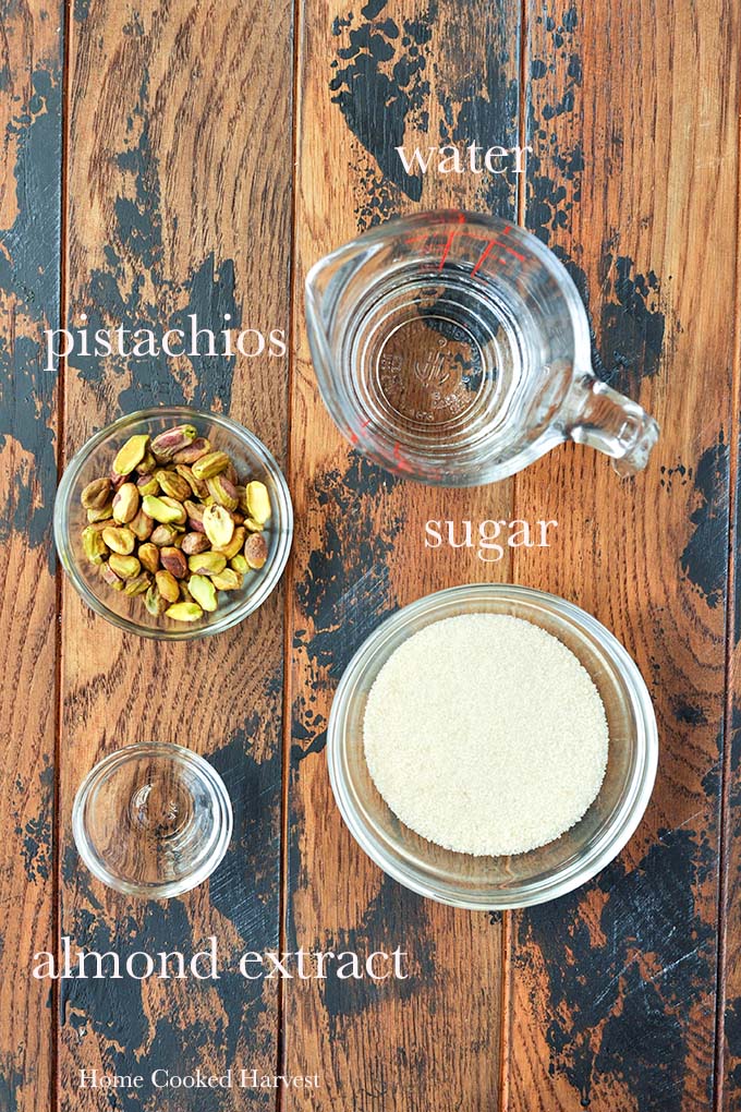 All of the ingredients needed to make pistachio syrup.