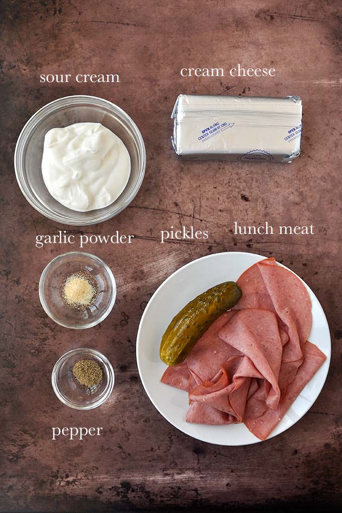 All of the ingredients needed to make dill pickle dip.