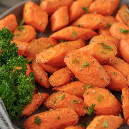 A plate of rosemary carrots made in the air fryer.