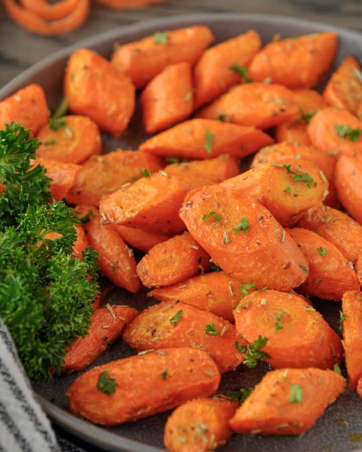 A plate of rosemary carrots made in the air fryer.