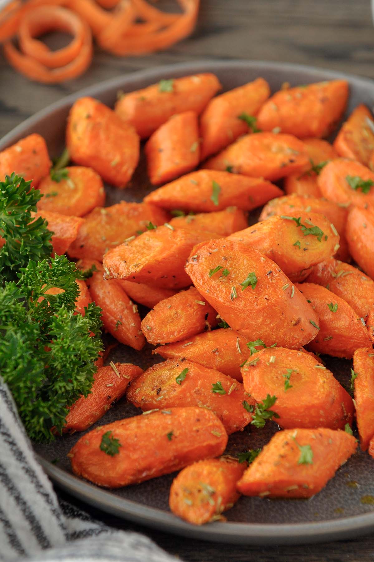 A plate of rosemary carrots made in the air fryer.