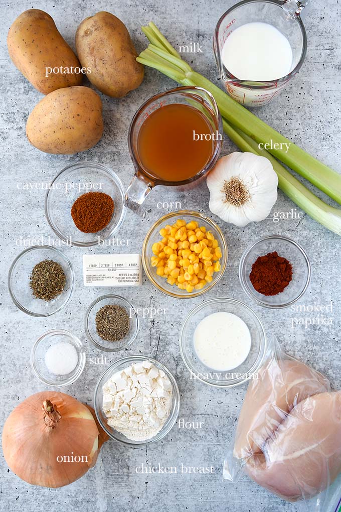 All of the ingredients needed to make corn chicken chowder.