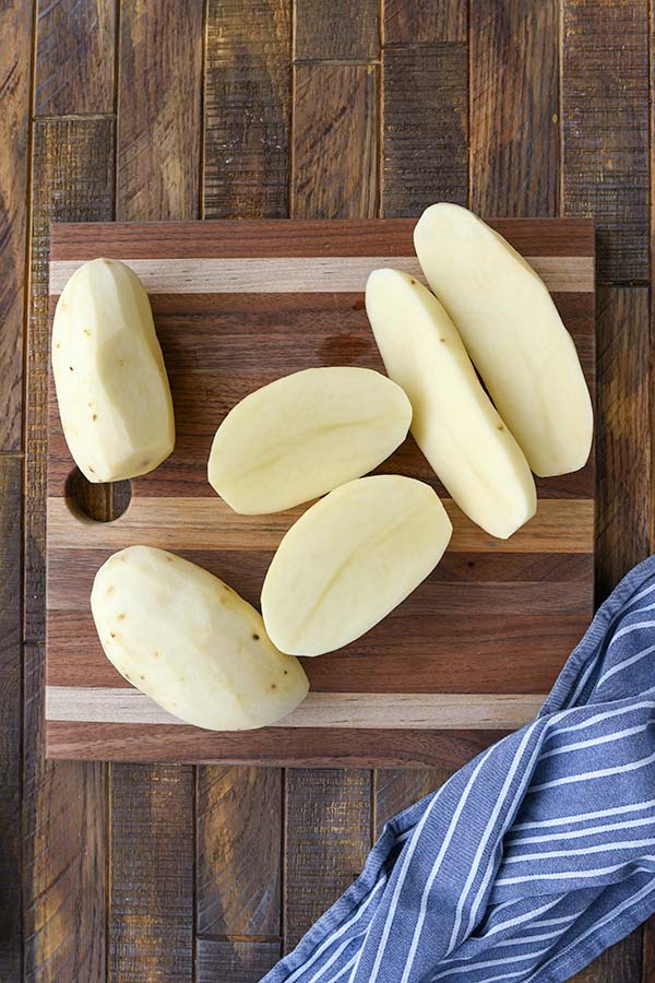 Step one is potatoes sliced in half.