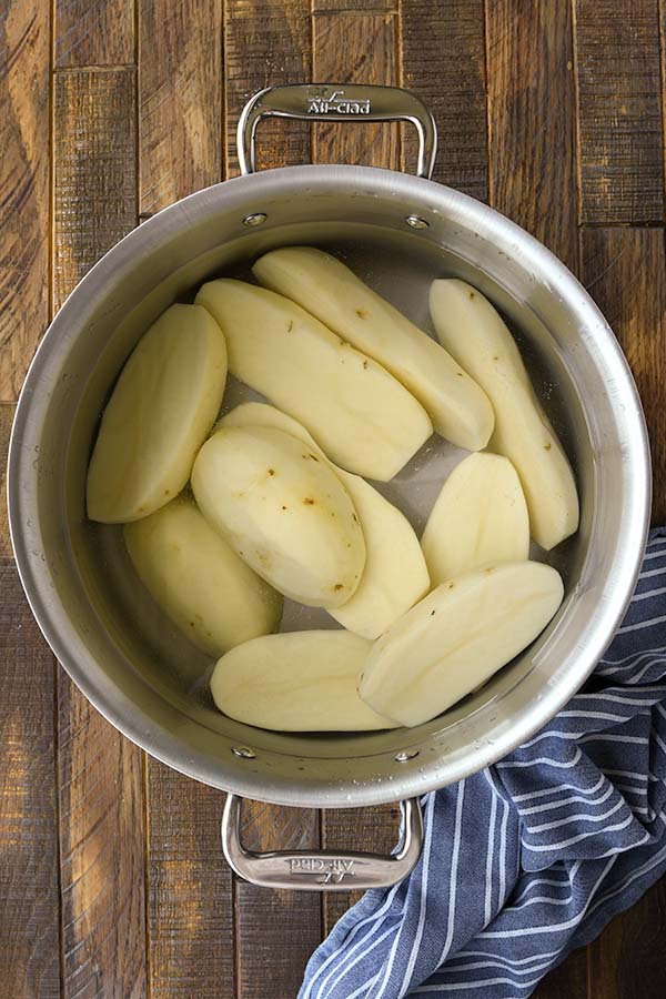 Step two is a pot of cut potatoes in salted water.