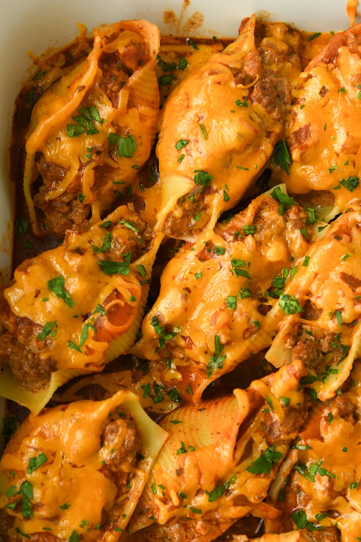 Above view of stuffed shells in a baking dish.