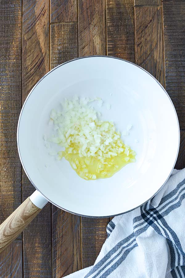 Step one is sautéing onions with the oil.