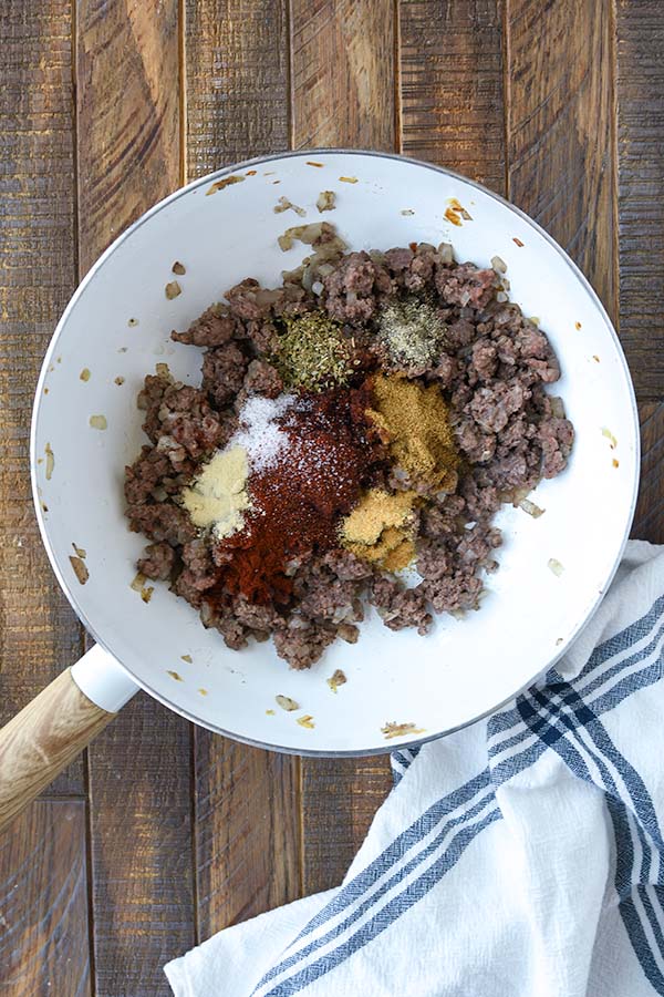 Step three is a pan with cooked ground beef and all the seasonings added in.
