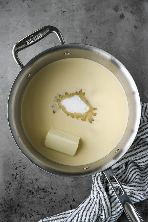 Step one is a pot of the evaporated milk, sugar, butter, and salt.