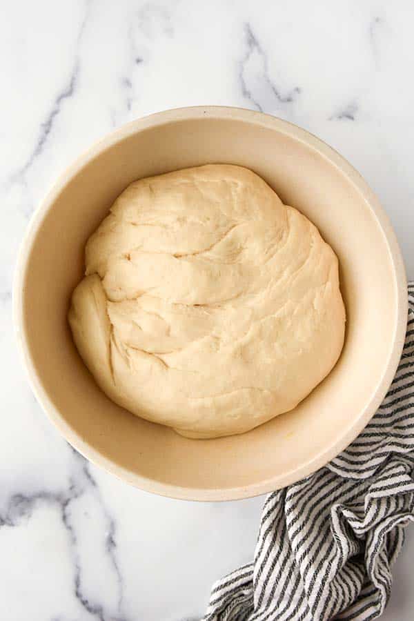 Step five is allowing the dough to double in size.