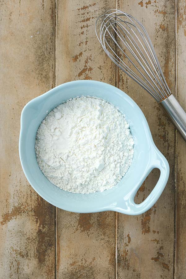 Step two is a small mixing bowl with flour, cornstarch, and salt.