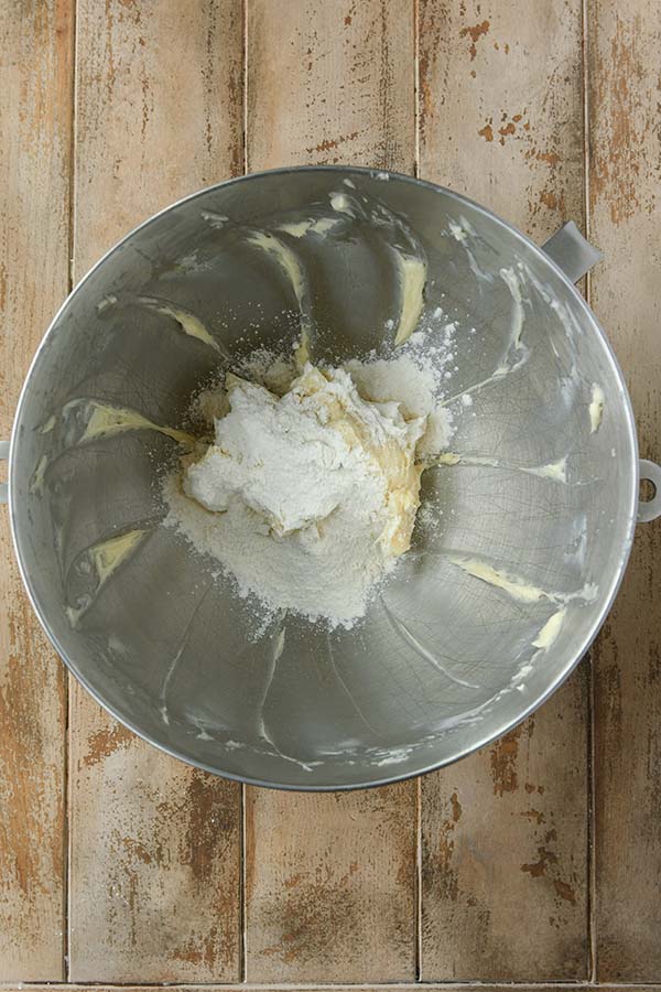 Step three is adding the dry ingredients into the butter mixture.
