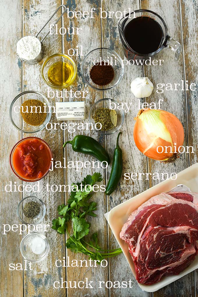All of the ingredients needed to make carne guisada.