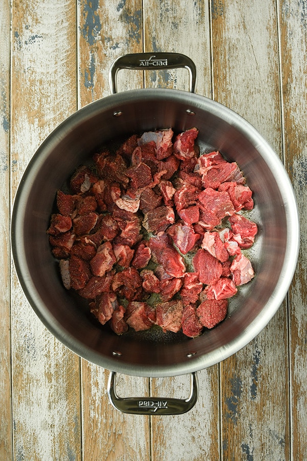 Step one is a pot of beef chunks browning.