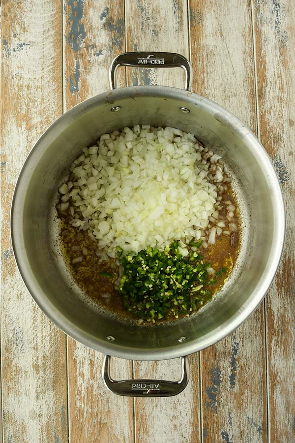 Step two with a pot of diced onions, peppers and oil.