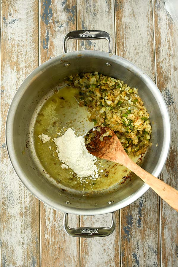 Step three is butter and flour added to the pot to make the roux.