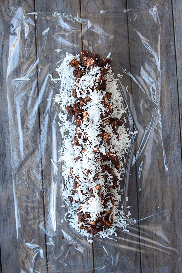 Step five is the rest of the coconut added on top of the chocolate mixture.