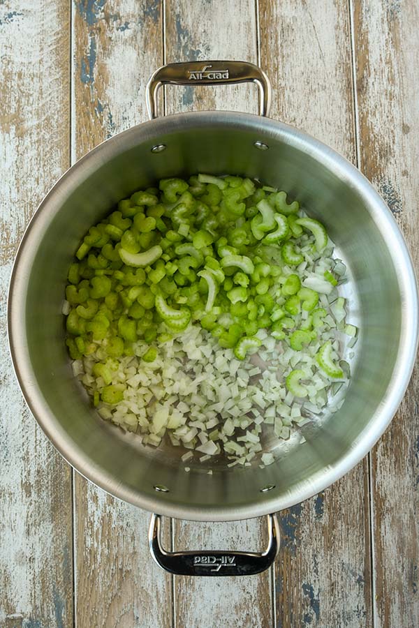 Step one is a pot with sauteeing onions and celery.