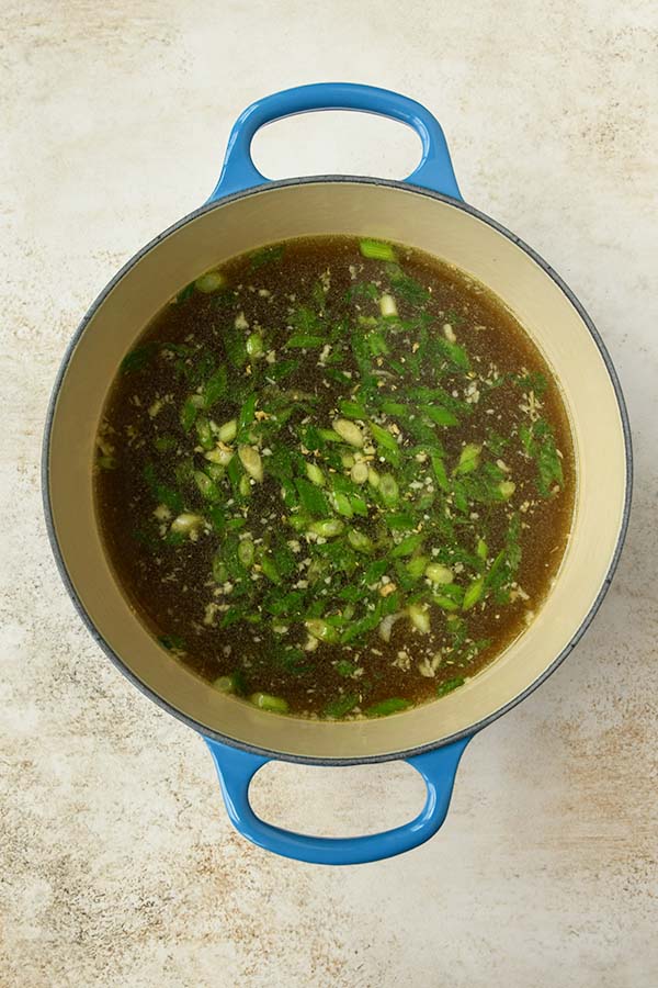 Step two is adding in the broth.