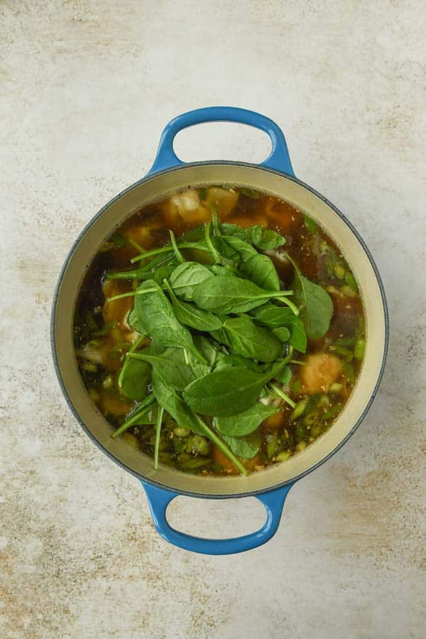 Step 4 is the spinach added as the final step.