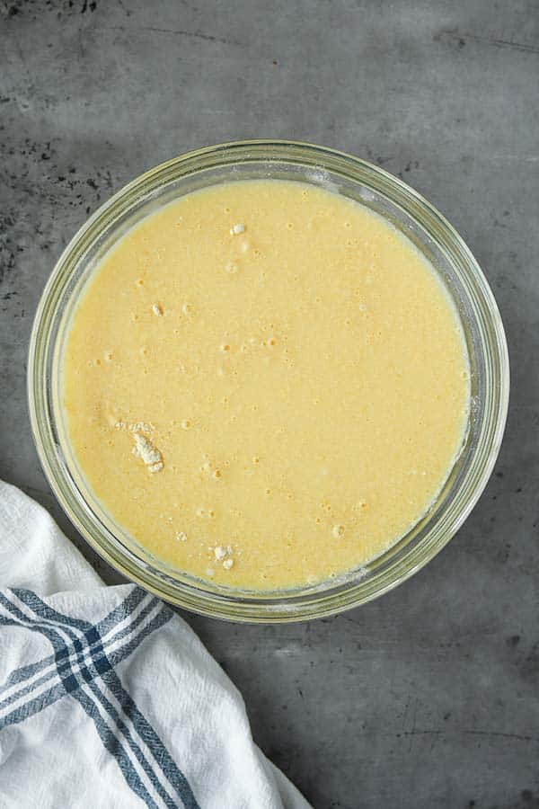 Step three is pouring the wet ingredients into the dry ingredients.