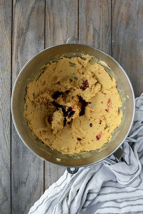 Step four is adding in the red food dye and the vanilla.