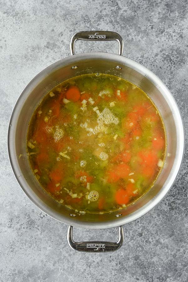 Step four add in the water and seasonings.