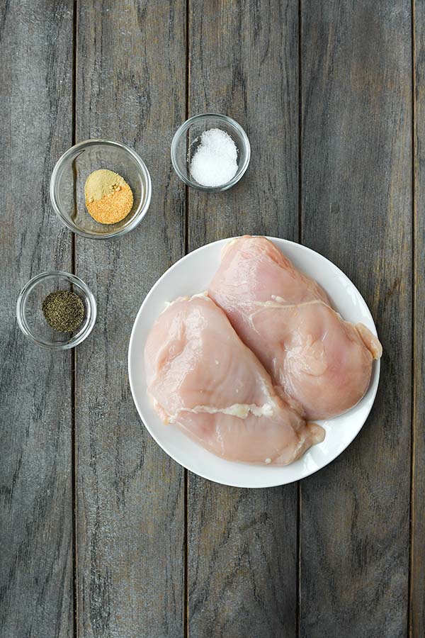 Step one is seasoning the chicken breast.