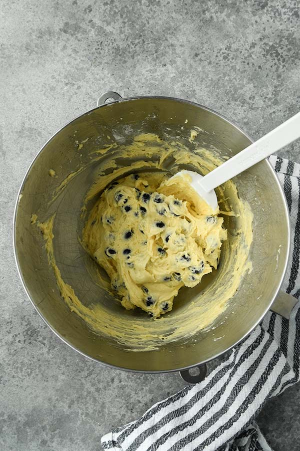 Step four is to add in most of the blueberries.