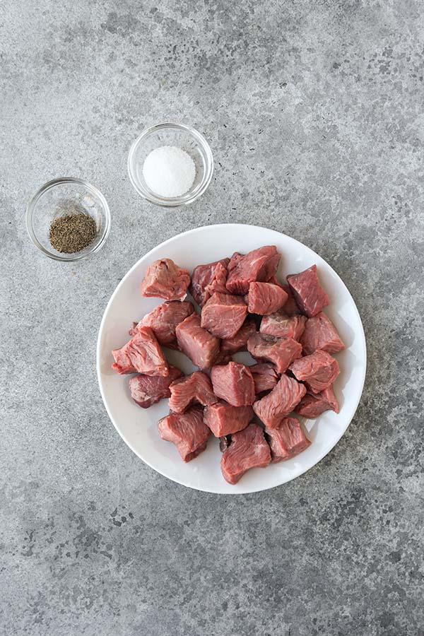Step one is the cut steak bites with salt and pepper.