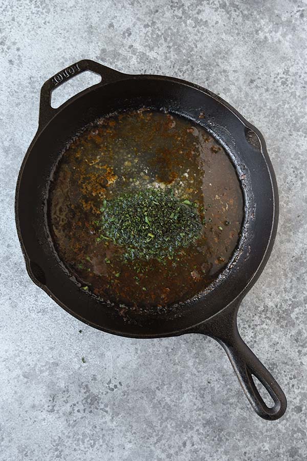Step four melt the butter and add in the rosemary.