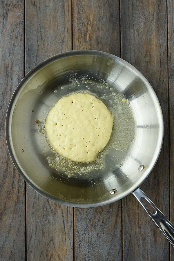 Step five, is a pancake in the pan that has started getting little bubbles. This means it's time to flip.