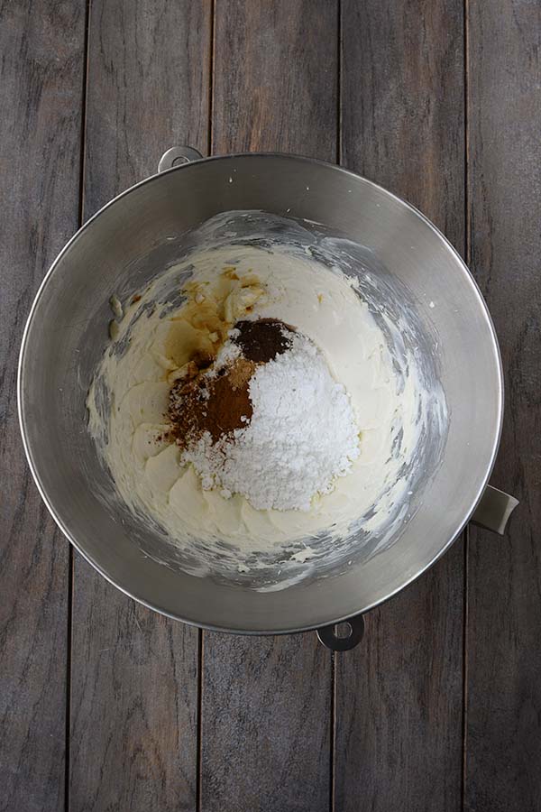 Step eleven is all of the ingredients to make the frosting in a bowl. 