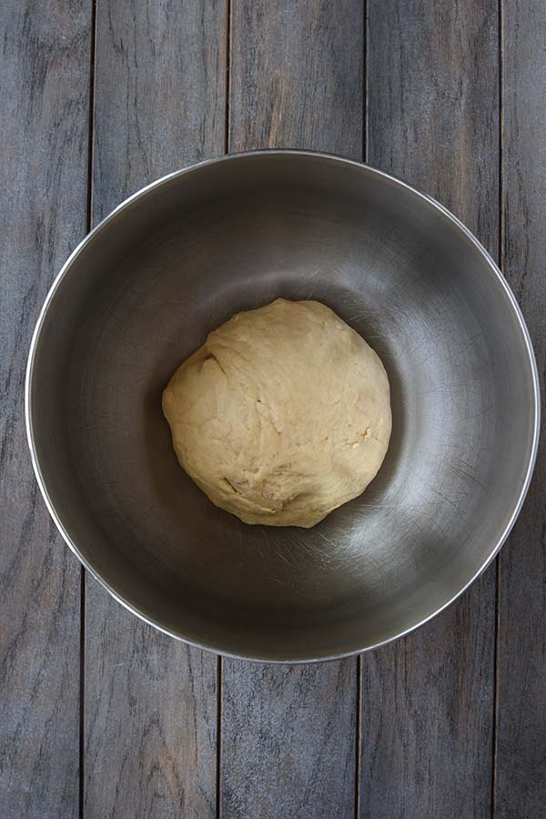 Step two is the dough put into a greased bowl to rise.