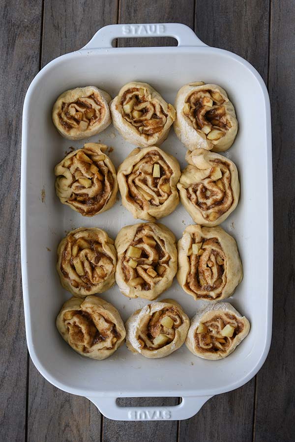 Step eight is the cut rolls placed into a buttered baking dish to rise.