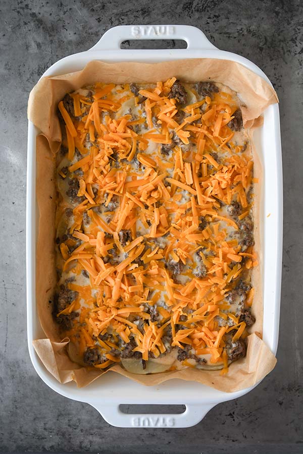 Step nine is baking the casserole then adding the last bit of cheese on top and cook for a little longer.