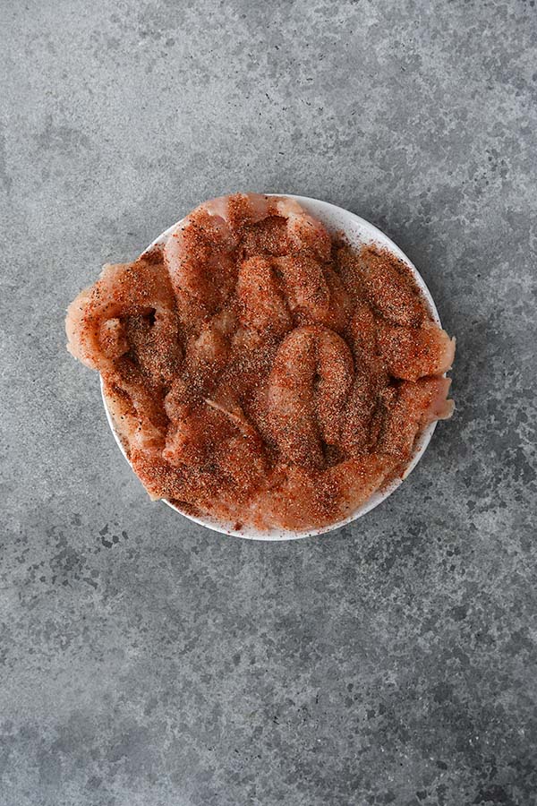 Step four is seasoning the chicken.
