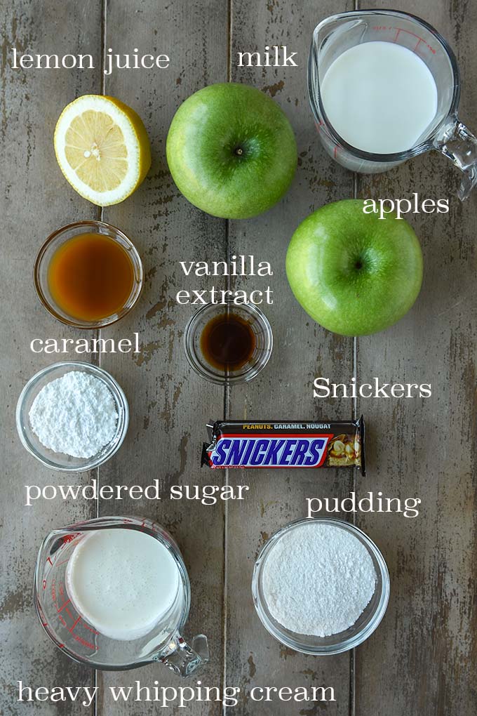 All of the ingredients needed to make Caramel Apple Snickers Salad.