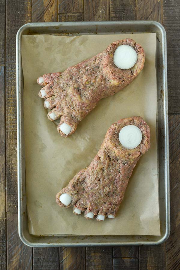 Step five is the onion toenails and ankle bone added to the shaped feet.
