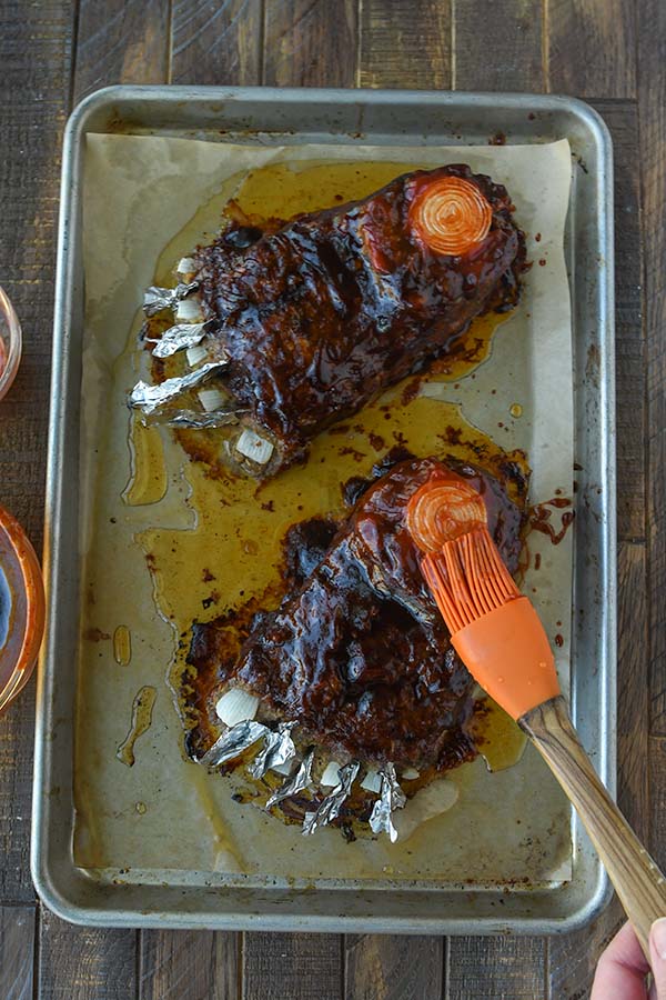 Step six is brushing on the bbq sauce and then the ketchup after the feet have baked.